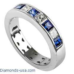 Princess cut diamonds and blue Sapphires channel set in a ring